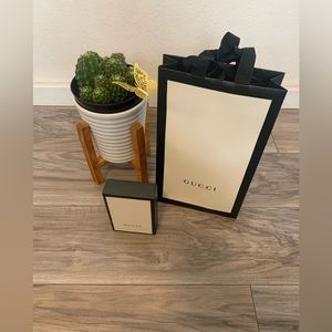 Gucci paper gift bag and gift box.
